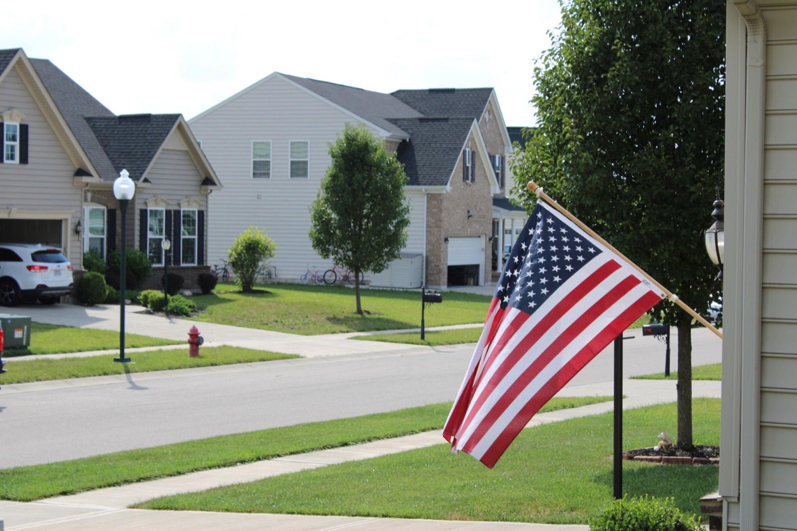 An American flag flying outside a home in an Arizona neighborhood
